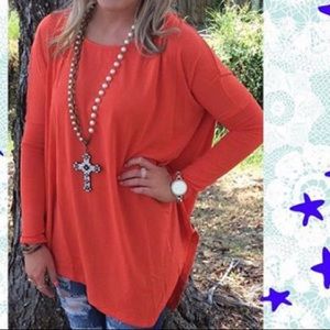 Orange Asymmetrical Hem Dolman sleeve top